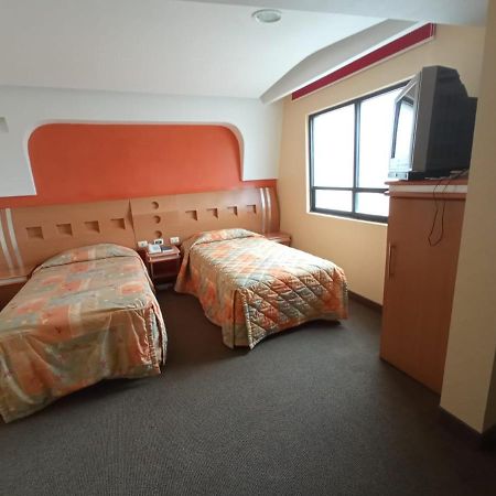 Hotel Terminal De Пуэбла Экстерьер фото